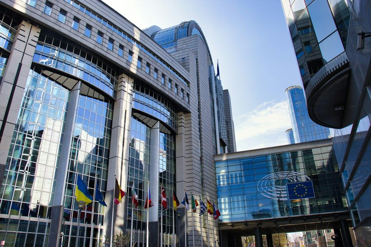 Government buildings with national flags flying outside